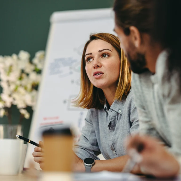 Hr Services In New York 8 a man and a woman sitting at a table